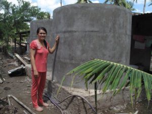 MCNV loan allow her to build water containers to save rain water to prepare for draught and salinity